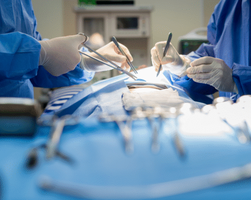 Surgical team performing an operation in a hospital operating room, illustrating wrong-site surgery, surgical errors, and potential medical malpractice claims.