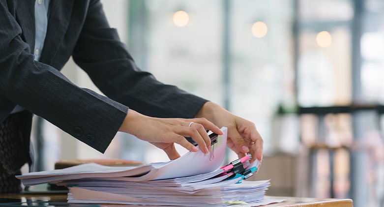 person looking through files